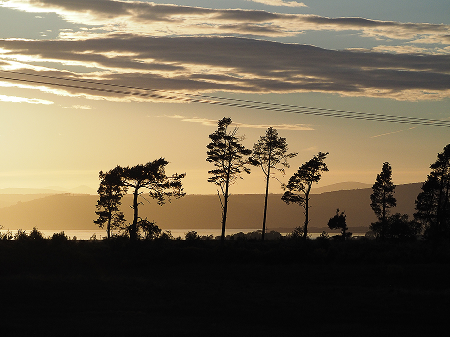 zonsondergang boven Moray Firth vanuit Balblaire Cottage at Byre